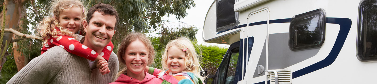 Happy family enjoying the new RV they got from USSCO